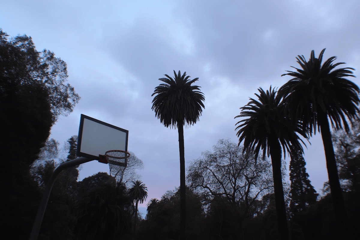 Outdoor basketball court before a local pickup run